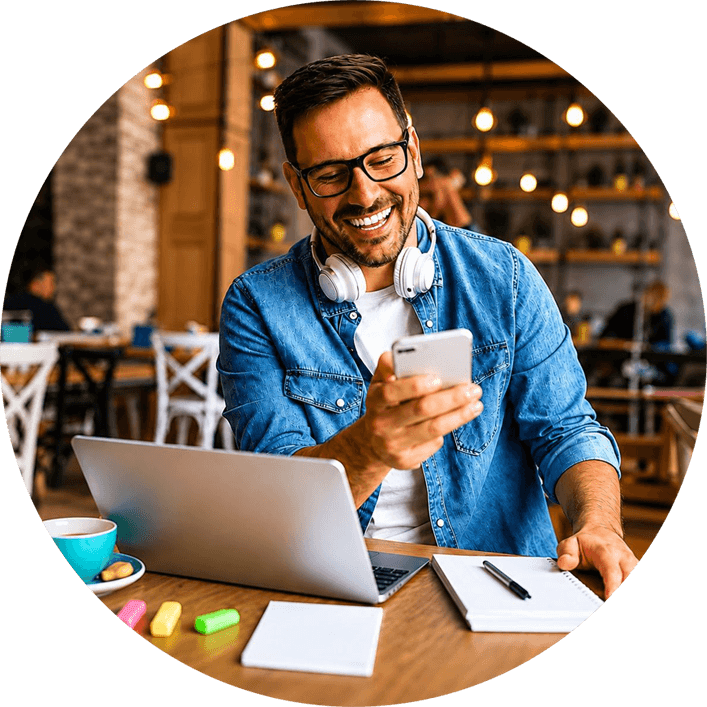 Happy man using phone